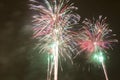 Bright colorful fireworks on new years eve in Ostrava, Czech republic against cloudy sky Royalty Free Stock Photo