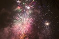 Bright colorful fireworks on new years eve in Ostrava, Czech republic against cloudy sky Royalty Free Stock Photo