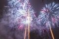 Bright colorful fireworks on new years eve in Ostrava, Czech republic against cloudy sky Royalty Free Stock Photo