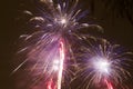 Bright colorful fireworks on new years eve in Ostrava, Czech republic against cloudy sky Royalty Free Stock Photo