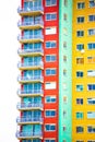 Colorful geometric apartment building facade with windows