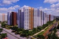 Bright colorful HDB flats buildings in Singapore, against cloudy blue sky. Panoramic view Royalty Free Stock Photo