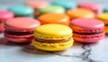 Bright colorful macarons on marble background with soft light reflections Royalty Free Stock Photo