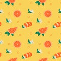 Bright colorful seamless pattern with orange fruit, skin peel, leaves and blooming flowers. Juicy tropical summer fruits Royalty Free Stock Photo