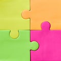 Bright colorful stickers for notes in form of puzzles. multicolored square sheets of paper close-up, copy space. Colorful puzzle Royalty Free Stock Photo