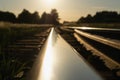 bright colorful summer sunset over the railroad. horizontal photo. Royalty Free Stock Photo