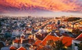 Bright colorful sunset over the capital of Portugal Lisbon, arial city view Royalty Free Stock Photo