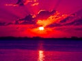 Bright colorful sunset with reflection in the ocean Royalty Free Stock Photo