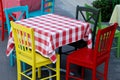 Colorful table and chairs in the summer cafe Royalty Free Stock Photo