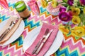 Bright colorful table setting with chevron tablecoth