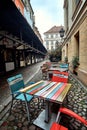 Bright colorful tables and chairs of Heineken street cafe in Wroclaw, Poland