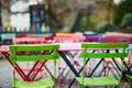 Bright colorful tables of Parisian outdoor cafe on Montmartre Royalty Free Stock Photo