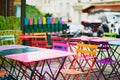 Bright colorful tables of Parisian outdoor cafe on Montmartre Royalty Free Stock Photo