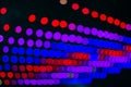 Bright colorful unfocused bokeh wallpaper pattern red purple and blue colors on black background space Royalty Free Stock Photo