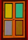 Bright colorful window shutters with four panels Royalty Free Stock Photo