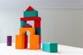 Bright colorful wooden blocks toy. Bricks children building tower, castle. Royalty Free Stock Photo