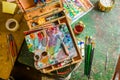 Bright Colorful workplace of the artist with brushes and oil paints