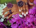 Bright colorfull shot of african tanned hands with