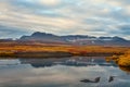 The bright colors of autumn in the mountains and on the river. Royalty Free Stock Photo