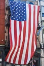 Huge 4 story American flag hanging from a Philadelphia, Pennsylvania building