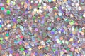 Bright colourful background with holographic glitter confetti. Can be used for artworks.