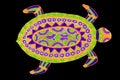 A gel pen drawing of a colorful patterned turtle.