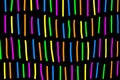 Bright colourful vertical lines in horizontal rows.