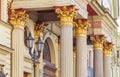 Bright columns of the building, Old courtyard, gilded cola Royalty Free Stock Photo