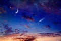 Bright comet, falling star and crescent in glowing sunset sky