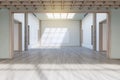 Bright concrete exhibition hall interior with wooden flooring, empty posters and sunlight. Gallery concept. Royalty Free Stock Photo