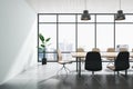 Bright concrete and wooden meeting room office interior with panoramic windows, city view, lamps and furniture.