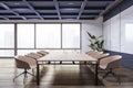 Bright conference room interior with furniture, concrete wooden and window and city view.