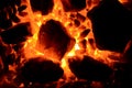 A bright contrasting background consists of burning anthracite coal of different fractions. Royalty Free Stock Photo