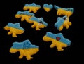 Bright cookies in the form of a map of Ukraine on a black background Royalty Free Stock Photo
