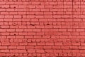 Bright coral color painted old brick wall texture. Red rough brickwork. Abstract masonry grunge industrial background Royalty Free Stock Photo