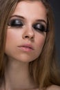 Bright cosmetics on young women and black lips Royalty Free Stock Photo