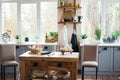 Bright cozy kitchen with windows, kitchen tools