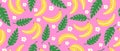 Bright creative pattern with bananas and tropical leaves, seamless tropical background Royalty Free Stock Photo