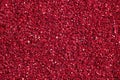 Bright crimson, red background with glitter. Can be used as texture in art projects.