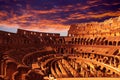Bright crimson sunset over the ancient Colosseum during a sunset. Rome. Italy Royalty Free Stock Photo