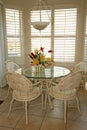 Bright dining room with shutters