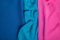 Bright draped background of multi-colored fabric