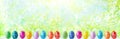 Bright early colored easter eggs on a sunny spring background Royalty Free Stock Photo