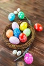 Bright early colored easter eggs wooden background Royalty Free Stock Photo