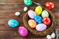 Bright early colored easter eggs wooden background Royalty Free Stock Photo