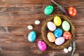 Bright early colored easter eggs wooden background Royalty Free Stock Photo