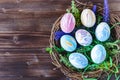 Bright early colored easter eggs wooden background Royalty Free Stock Photo