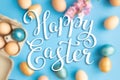 Bright easter eggs with happy Easter lettering, holiday concept. Selective focus