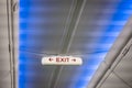 Bright exit sign in the modern jet plane