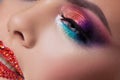 Bright eye makeup and red lips in rhinestones. Pink and blue color, colored eyeshadow. Royalty Free Stock Photo